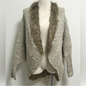 XOXO Knit Sweater with Faux Fur Trim.